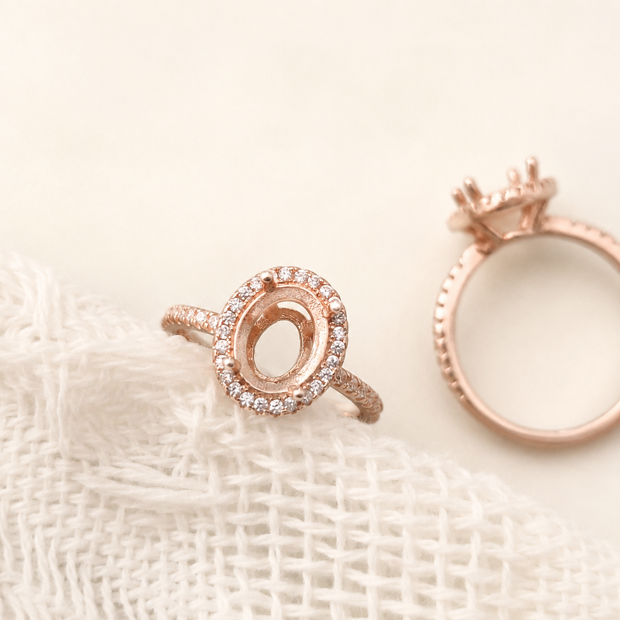 925 Sterling Silver Halo Oval Ring Setting in rose gold close up