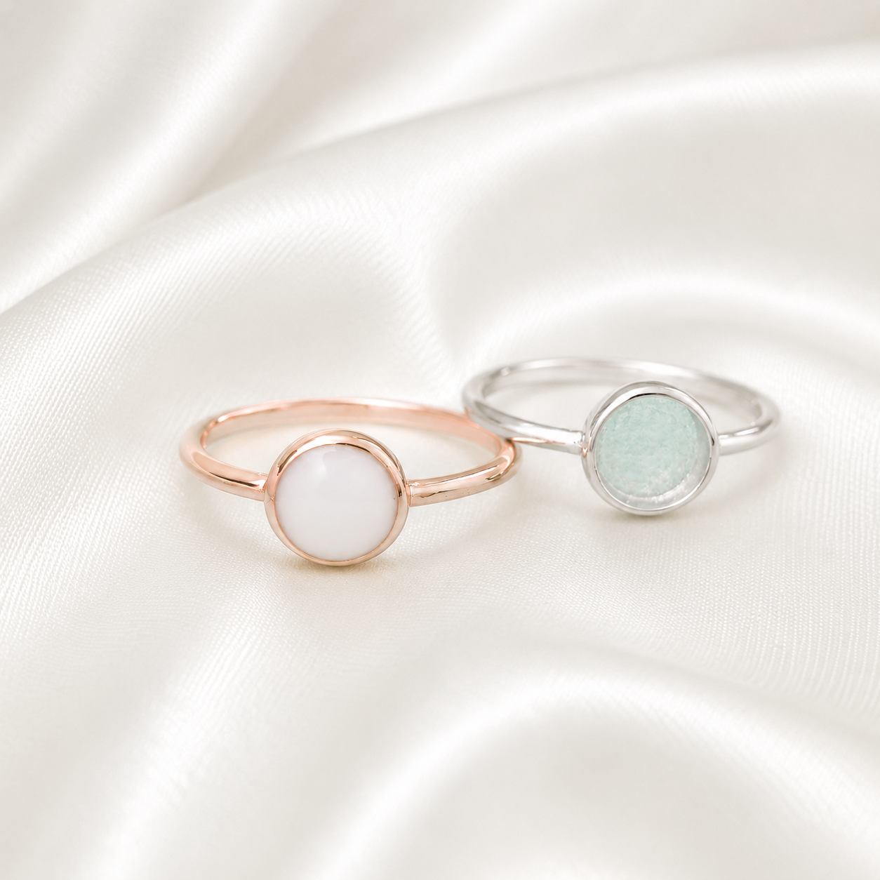 925 sterling silver round ring settings in rose gold and silver with stone on white satin