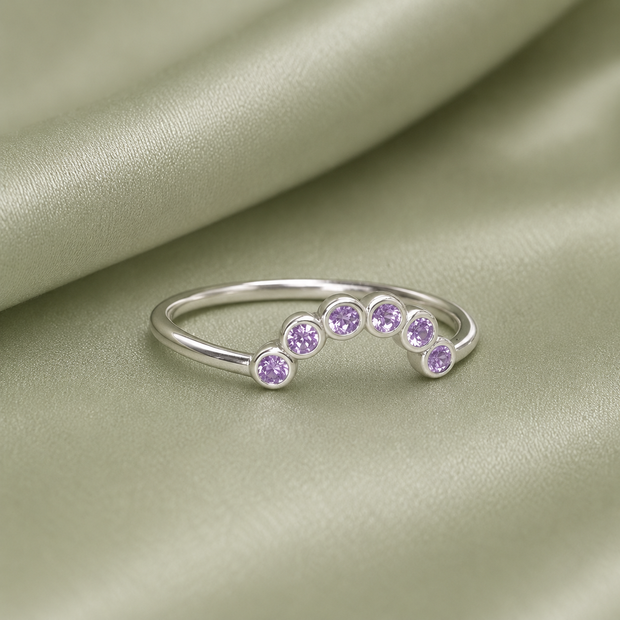 925 Sterling Silver curved bezel arc stacker ring with 6 lavender birthstone crystals on sage satin - close up