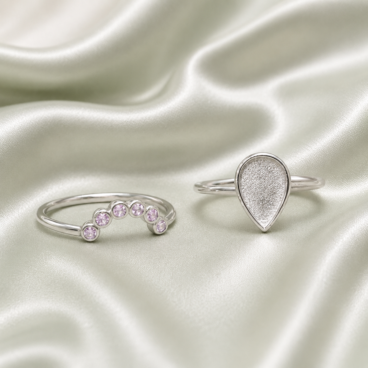 925 Sterling Silver teardrop blank ring set with pink bezel-set birthstone stacker band on sage satin