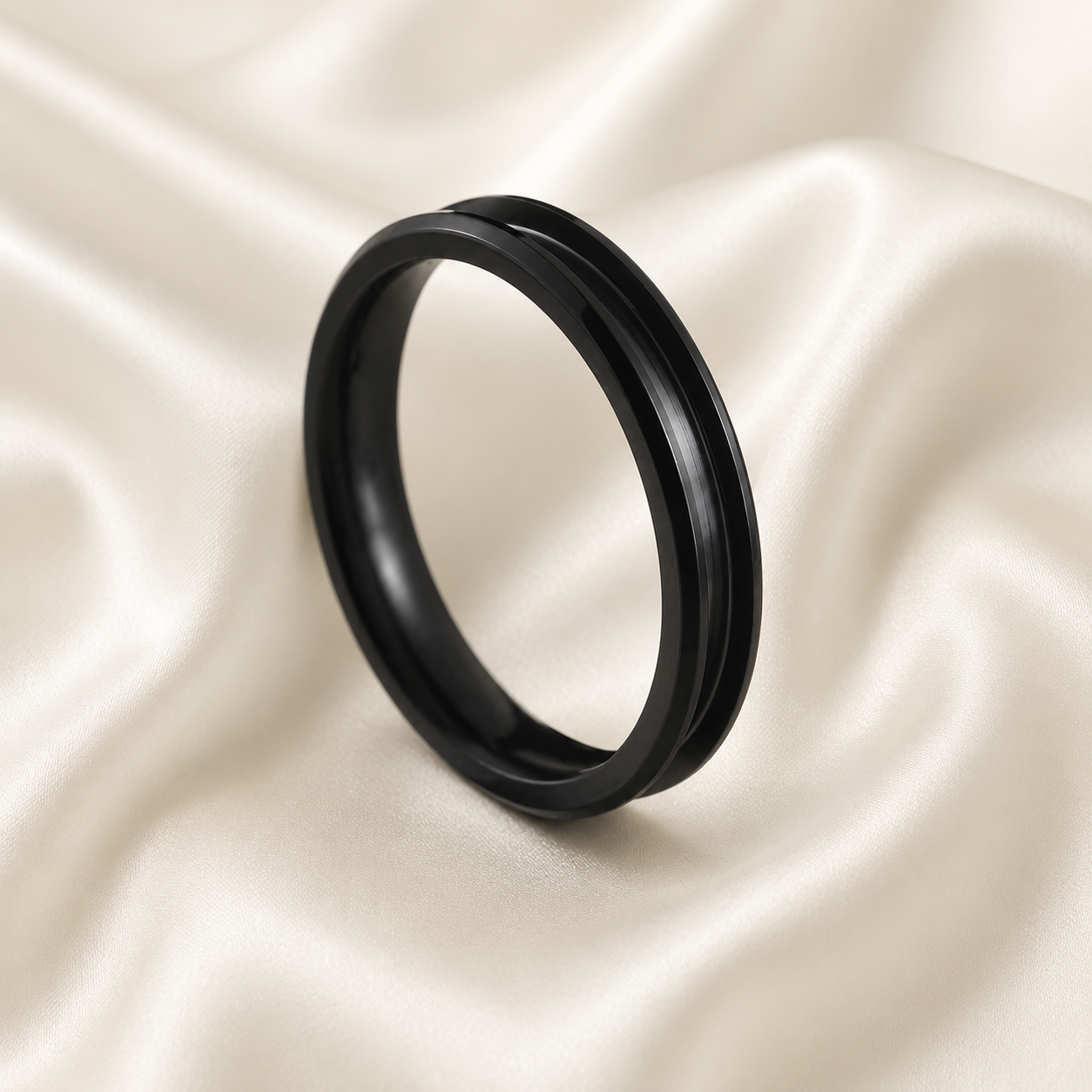 6mm matte black double-groove blank ring setting on cream satin fabric