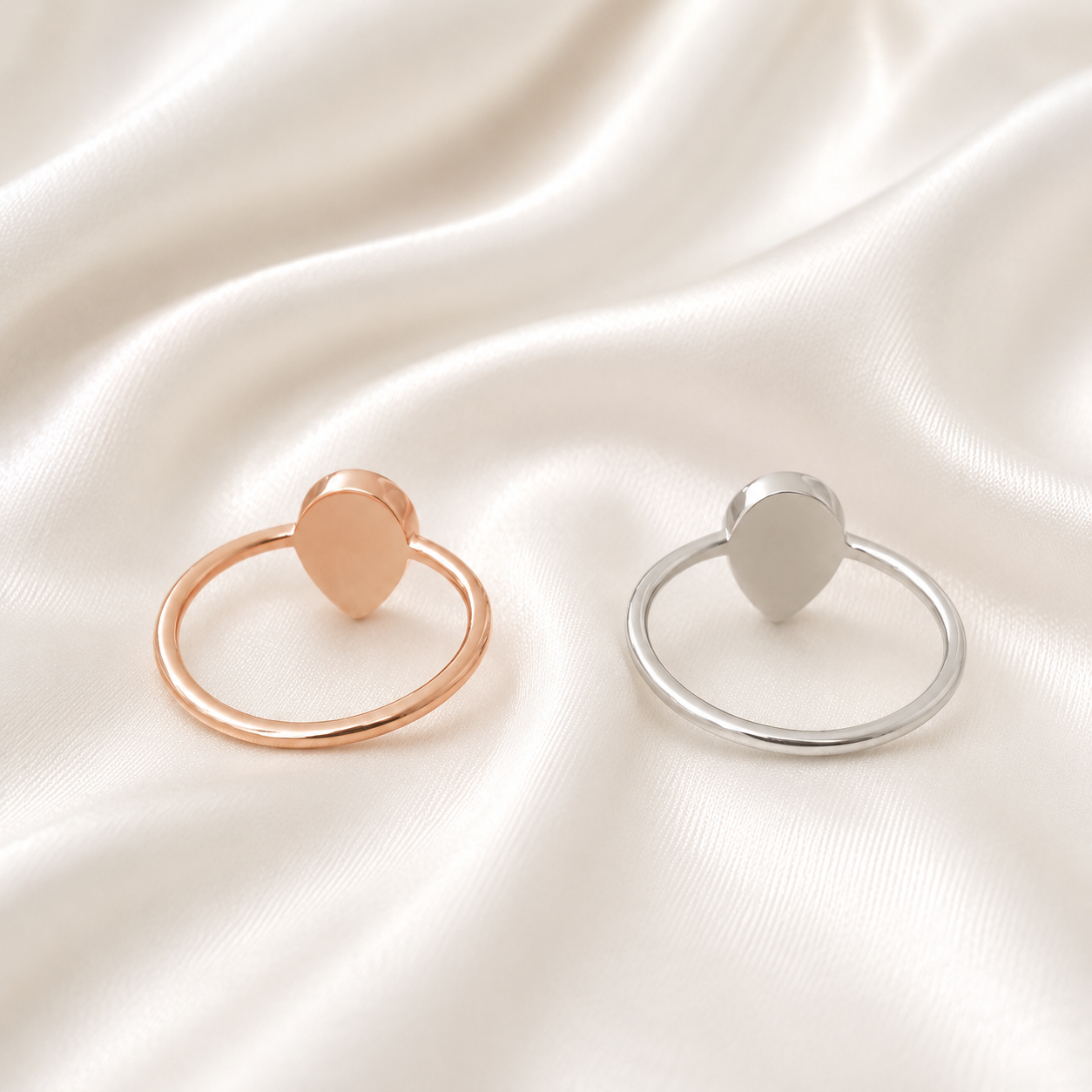 925 sterling silver heart ring settings in rose gold and silver on white satin