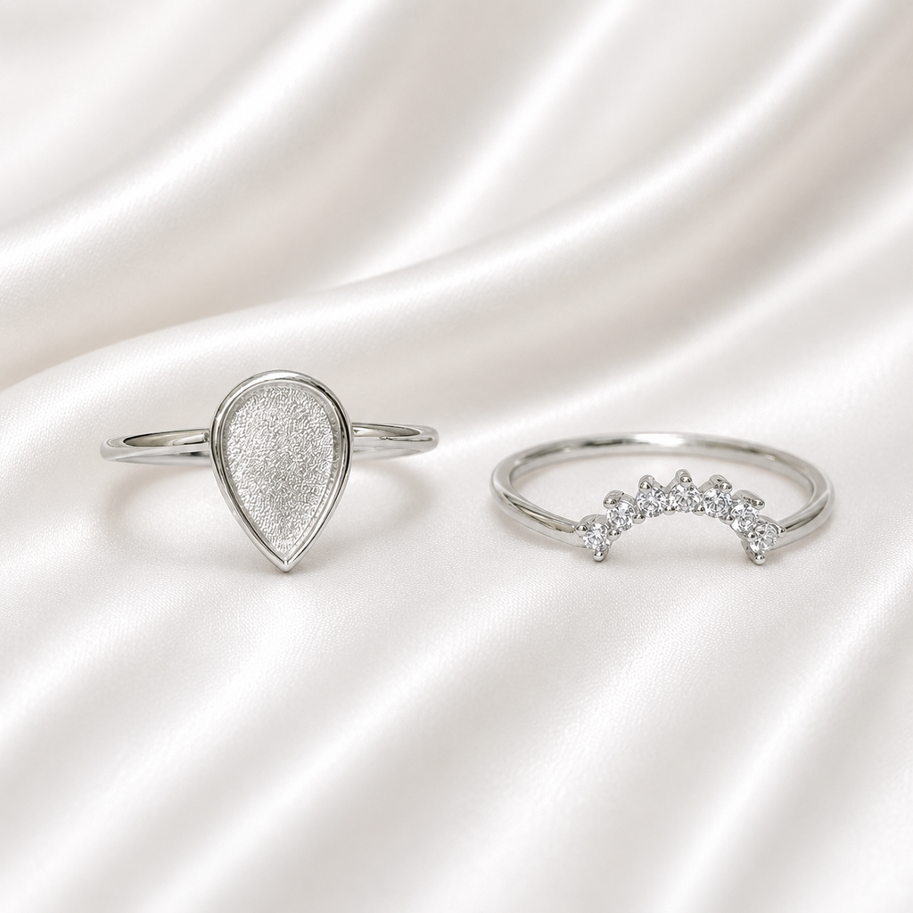925 Sterling Silver Teardrop Ring Set with white crystal stacker band on white satin