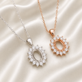 925 Sterling Silver Halo Oval Blank Necklace Setting – Silver and Rose Gold open blanks on cream background