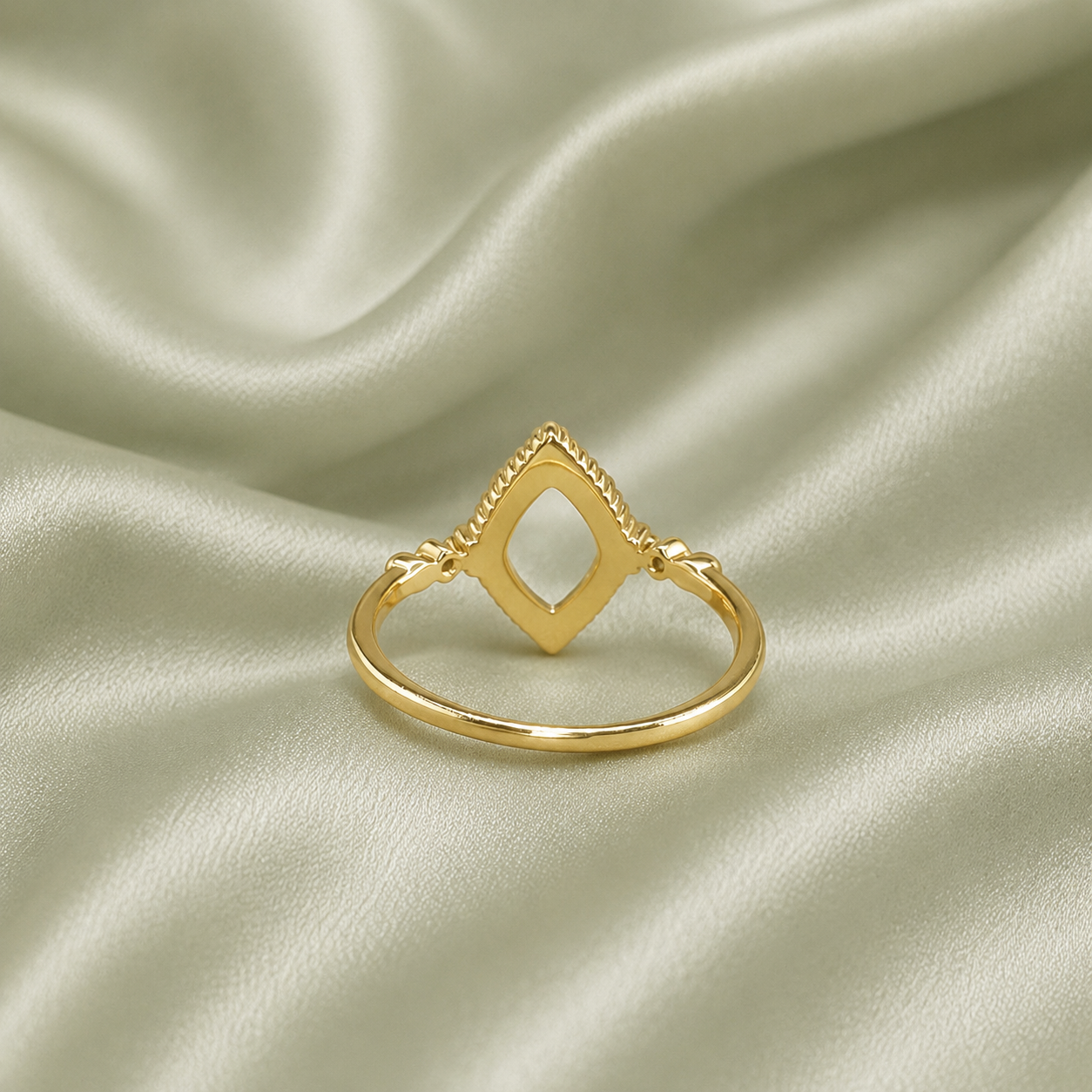 925 sterling silver gold diamond shape vintage ring setting showing open back bezel on sage satin