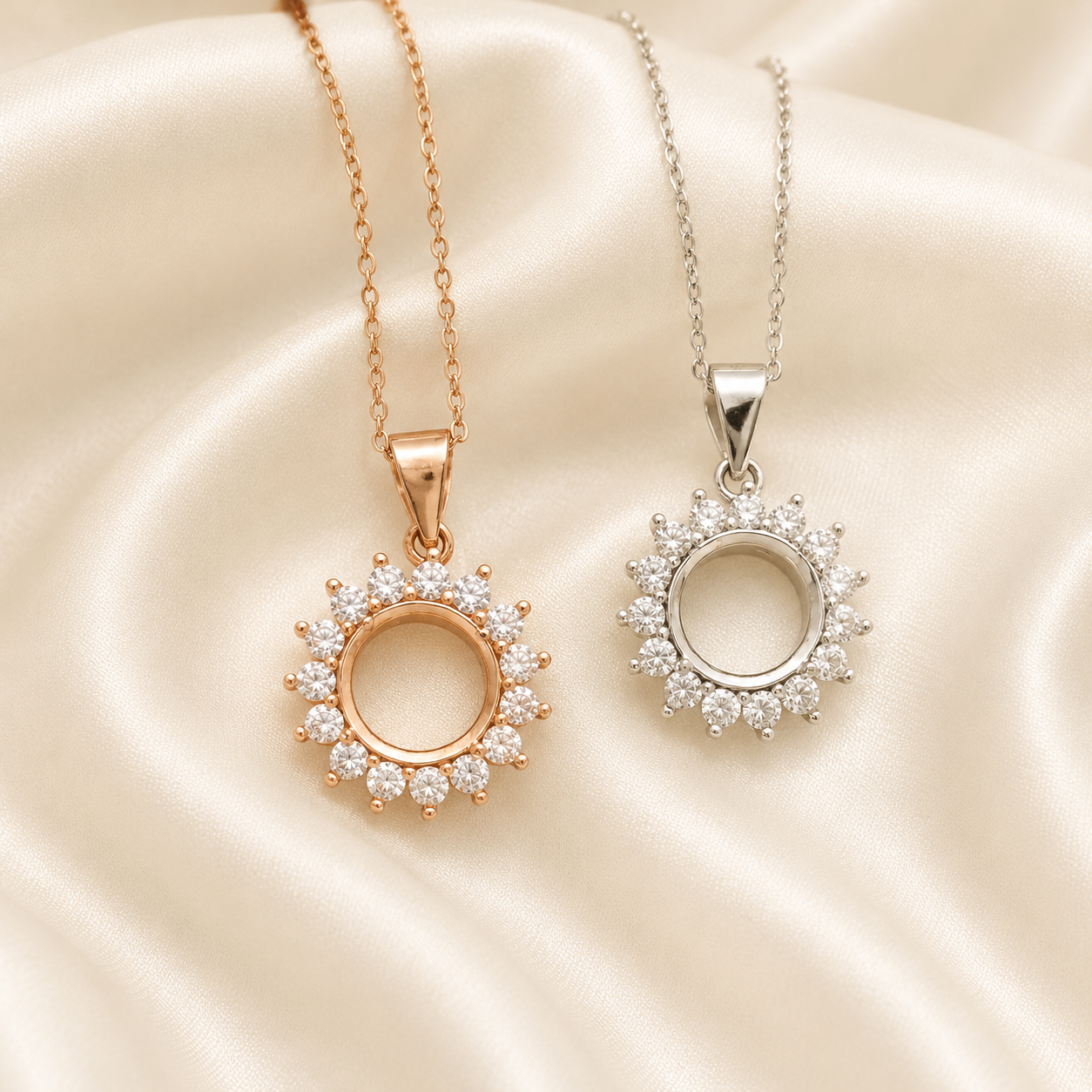 Rose gold and silver halo round blank necklace settings with CZ sunburst surround on cream satin - front view