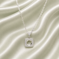 925 Sterling Silver Square Cushion Halo Blank Necklace Setting – open round center with CZ border on sage green background