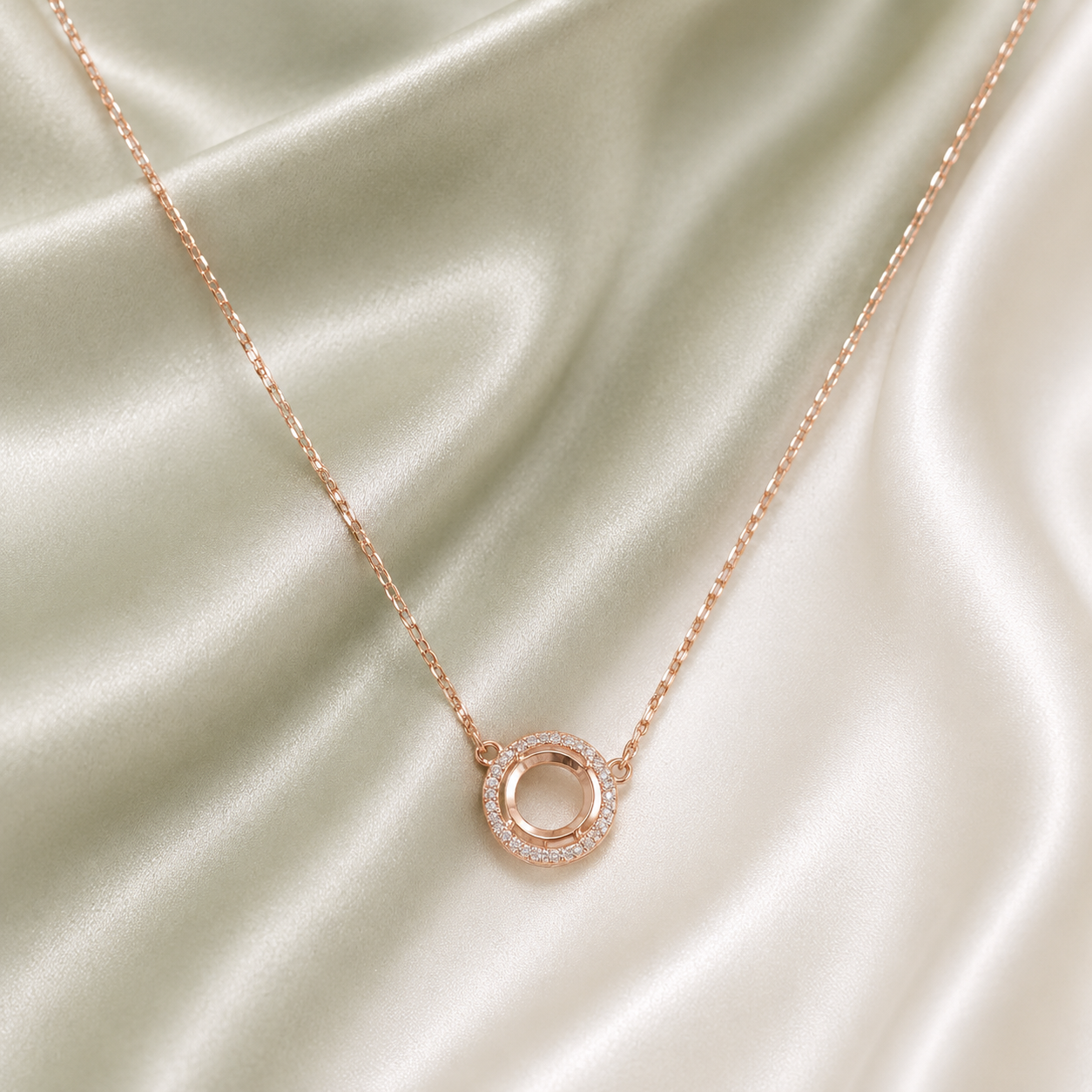 6.5MM Luxury Round CZ Prong Blank Necklace Setting – Rose Gold dainty halo on cream satin background