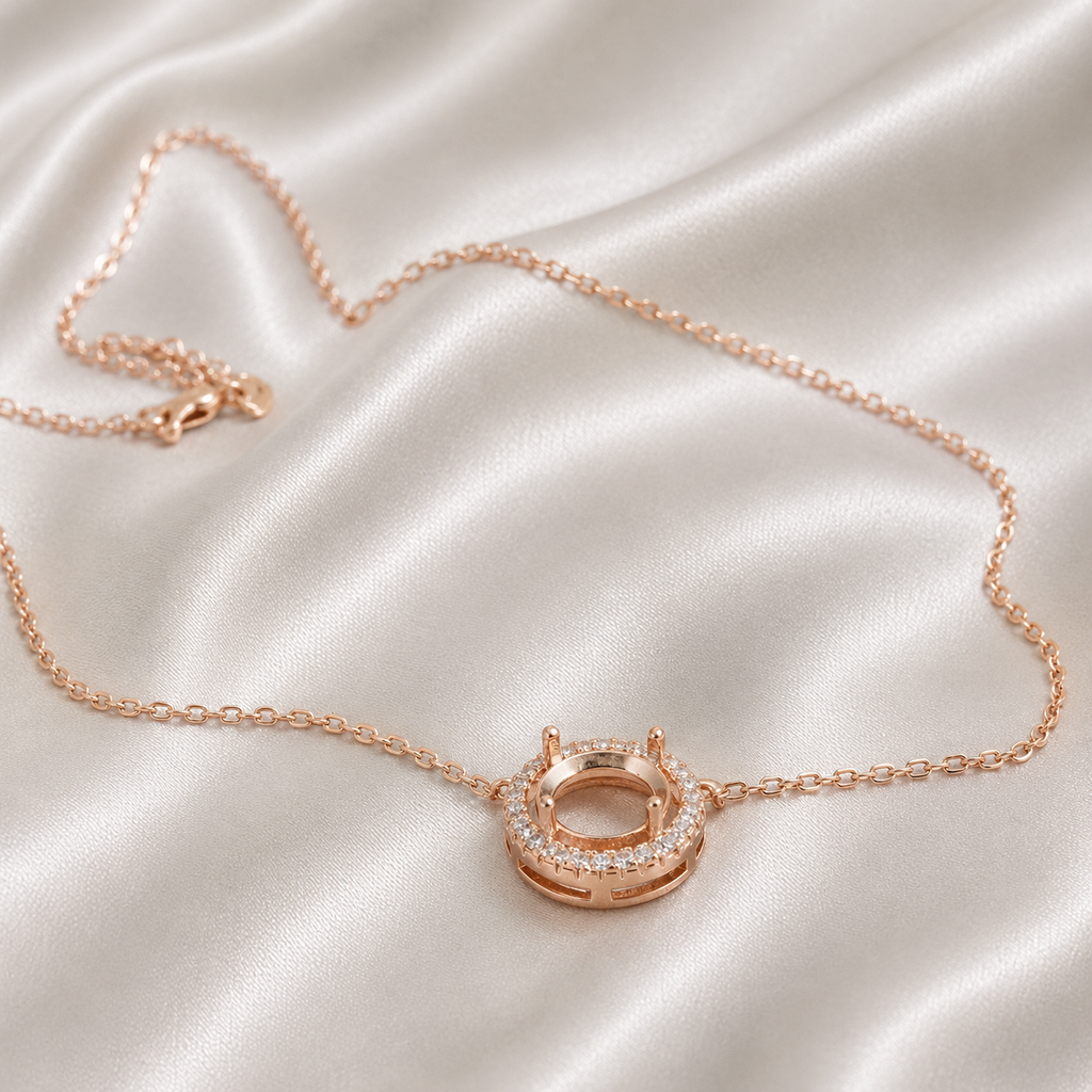 6.5MM Round CZ Prong Necklace Setting – Rose Gold side view showing prong detail and lobster clasp on cream background